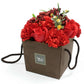 Luxury soap flower bouquet featuring red roses and carnations, elegantly arranged in a gift box.